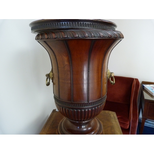 330 - Pair of George III mahogany wine cisterns, on cupboard stands, the cisterns formed as urns with dome... 