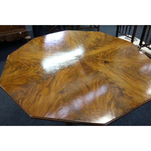 362 - George III mahogany breakfast table, the octagonal moulded edge top radially veneered, raised on cen... 
