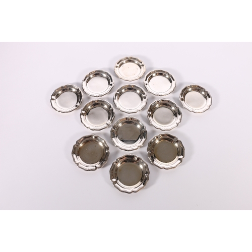 26 - Set of six Sterling silver miniature dishes with piecrust edges, the reverse stamped 