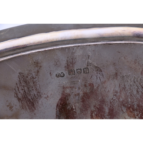 30 - George V silver tray with baton border raised on four splayed supports, the field with inscription 