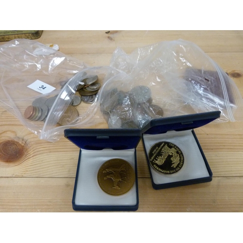 34 - Collection of coins and commemorative medals.