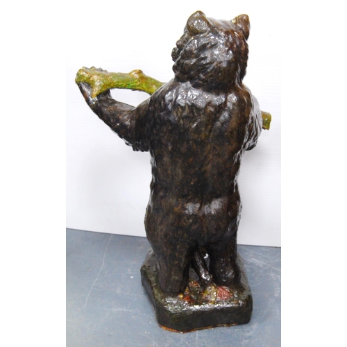 403 - Majolica stick stand attributed to Brownfield modelled as a bear holding a naturalistic branch, glaz... 