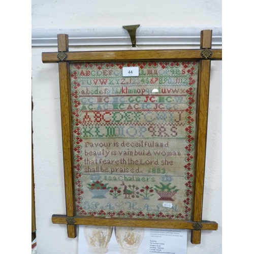 44 - Victorian sampler with alphabet, worked by Isa Chalmers, 1883, framed.