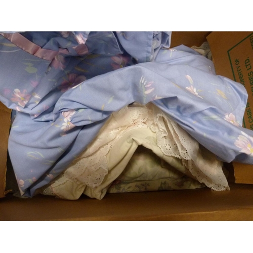 54 - Three boxes containing various items of linen, blankets and bedding etc.