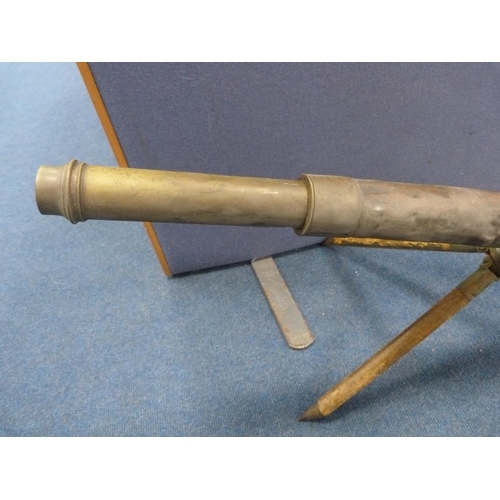17 - Antique brass telescope on a wooden tripod stand.