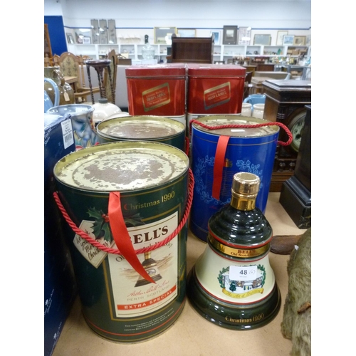 48 - Three Wade Bell's whisky decanters with contents, with tins, also two Johnnie Walker Red Label whisk... 