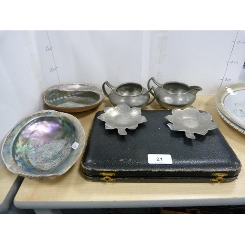 21 - South Sea-style shells with mother of pearl-style interior, pewter cream and sugar, pewter leaf dish... 