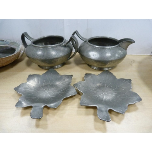 21 - South Sea-style shells with mother of pearl-style interior, pewter cream and sugar, pewter leaf dish... 