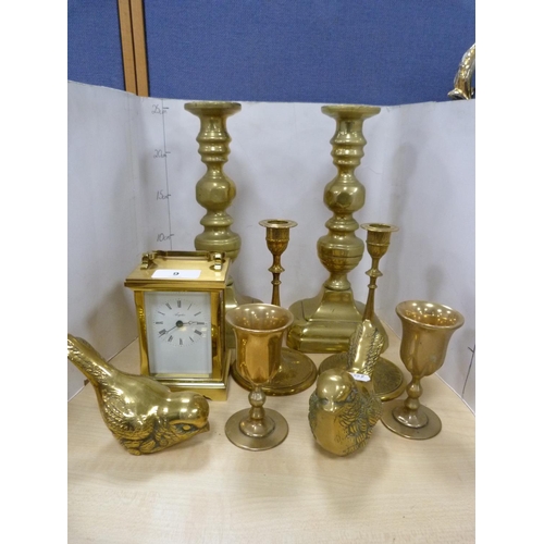 9 - Brassware to include a pair of candlesticks, small pair of candlesticks, bird ornaments, pair of gob... 