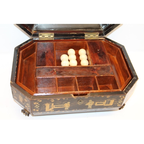 2 - Oriental export lacquered sewing box, with fitted interior, 28cm wide.
