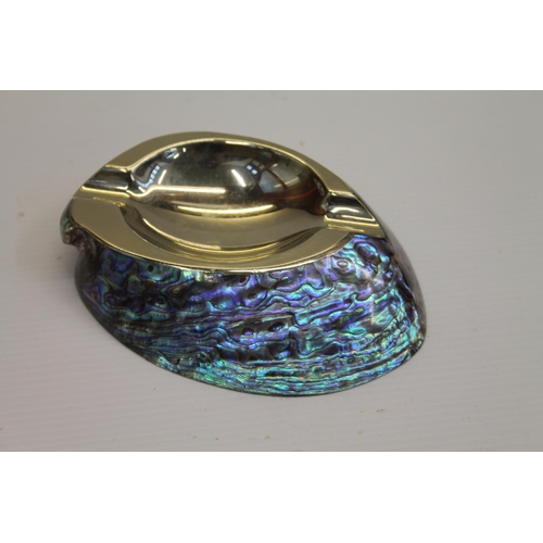 46 - Abalone and white metal mounted ashtray, 13cm.