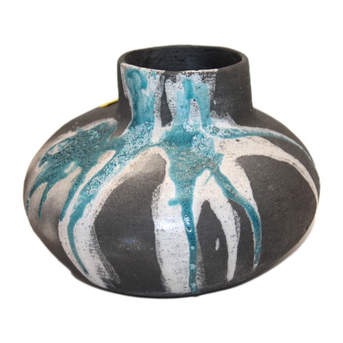 Basalt pottery vase with partial blue drip glaze, marked 'WHY' to base.