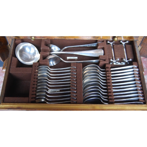 13 - Part canteen of EP cutlery enclosed in an oak table canteen comprising twelve table forks, twelve de... 