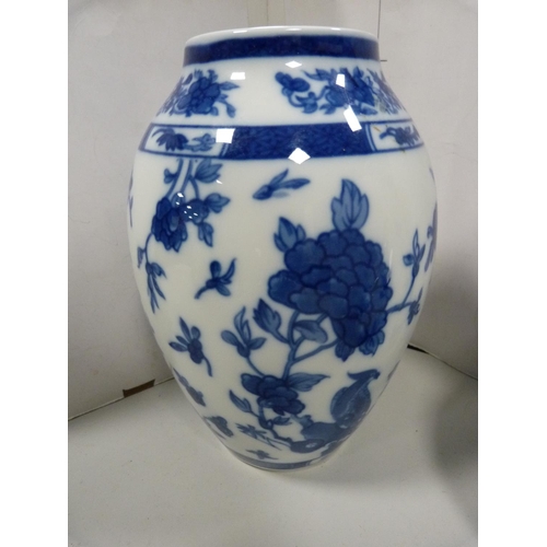 13 - Bernardaud Limoges Chinese-style baluster vase and an oviform vase.  (2)