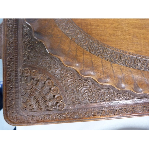 28 - Indian-style carved teak serving tray.