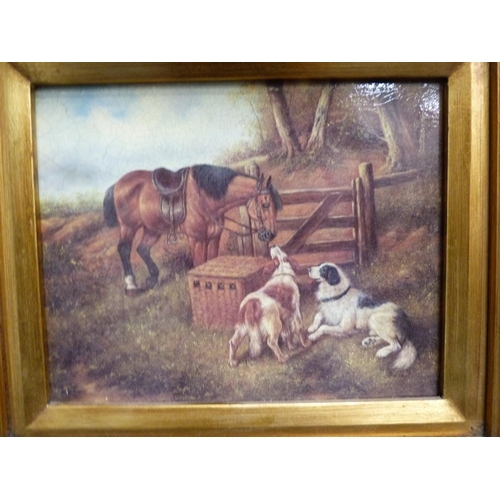 59 - Reproduction picture of dogs with a horse, in a gilt frame.