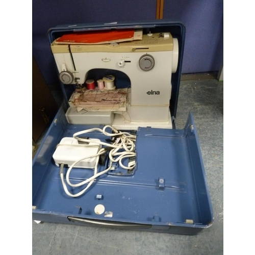 20 - Elna TSP sewing machine with fitted case.