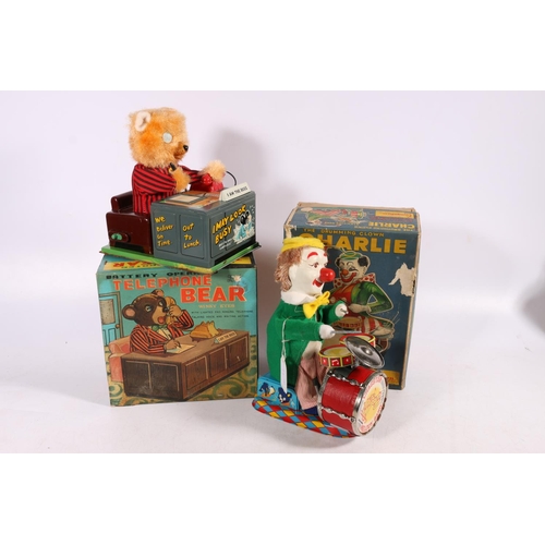 11 - Cragstan 774 battery powered 'The Drumming Clown Charlie' boxed and a battery operated 'Telephone Be... 