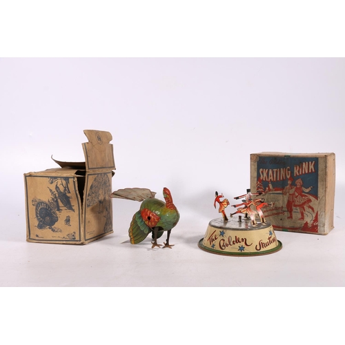 16 - US Zone Germany tinplate clockwork model of a peacock in the manner of Blomer & Schuler boxed an... 