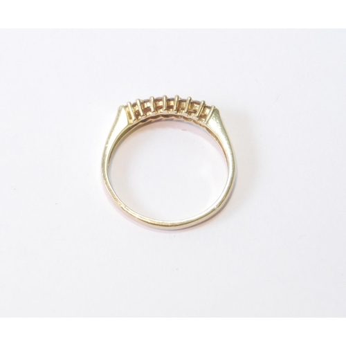 23 - 9ct gold half hoop ring with a double row of yellow diamonds, size T, 2.8g.