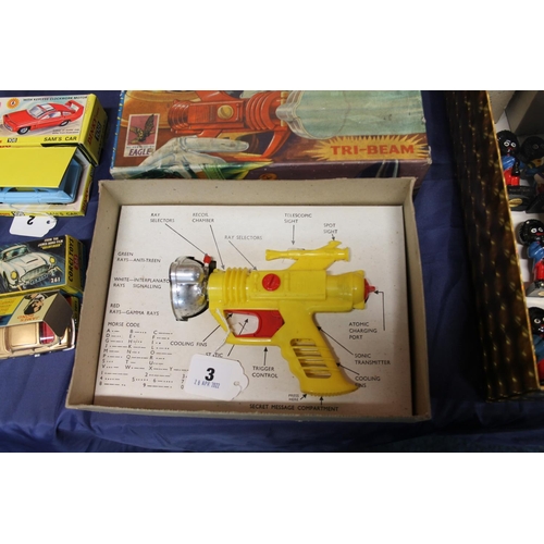 3 - Palitoy Dan Dare Cosmic Ray Gun, a red, yellow and chrome coloured plastic battery operated gun, box... 