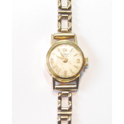 38 - Lady's gold watch, '750', on 9ct gold bracelet, 7.7g without movement.