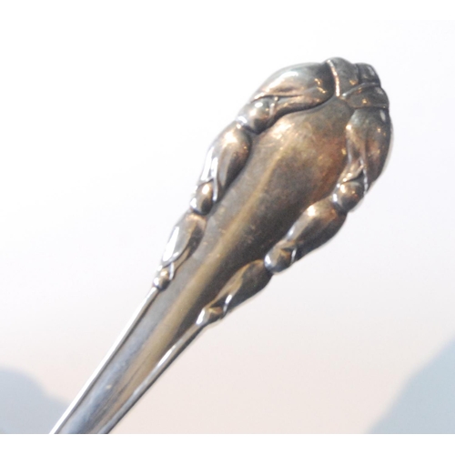 48 - Georg Jensen silver ladle of Rose or Lily of the Valley pattern, Import Marks 1928, 33g or 1oz.