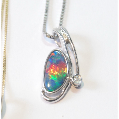 53 - Fire opal and diamond pendant, another, doublet opal, a pendant with caged faceted citrine drop and ... 