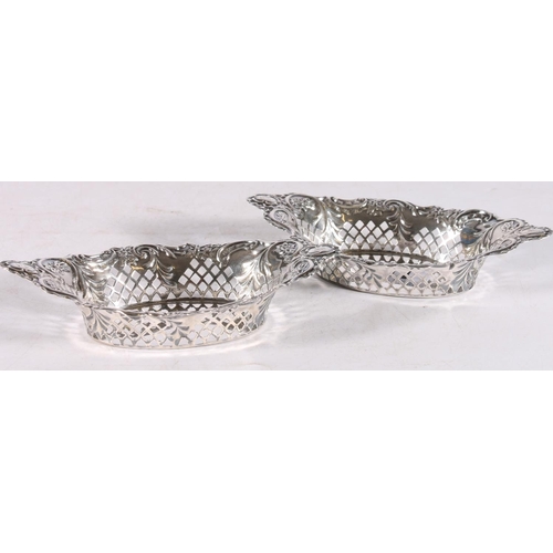 11 - Pair of sterling silver pierced bonbon dishes, with foliate decoration, maker A & J Z, Birmingha... 
