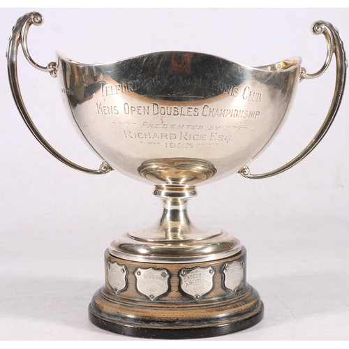 23 - George V sterling silver twin-handled trophy on hardwood stand, 'Telford Park Lawn Tennis CLub, Mon,... 