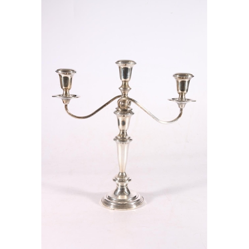 32 - Sterling silver three light candelabra on plain tapering column, stamped base Empire sterling weight... 