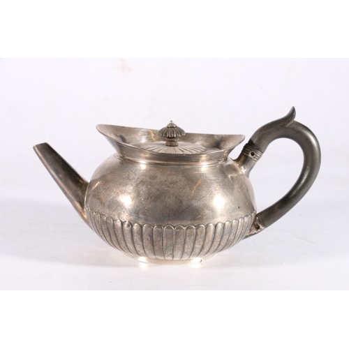 42 - George III sterling silver teapot with fluted body, no makers mark, London, 1801, 14cm tall, 596g.