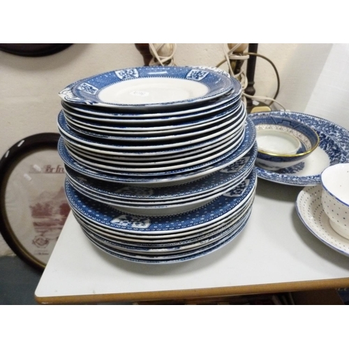52 - Part blue and white dinner set, tureen, a Willow pattern bowl, turned wood candle stand, a pair of t... 