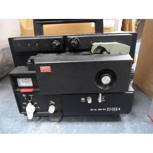 20 - Elmo ST-160 film projector with accessories, in original box.