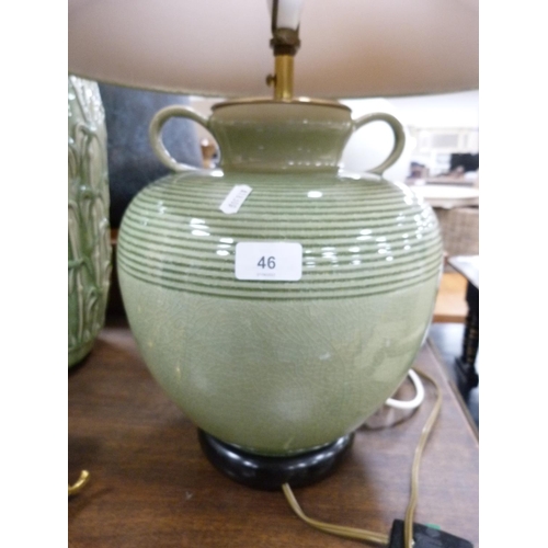 46 - Chinese-style celadon glazed table lamp with shade.
