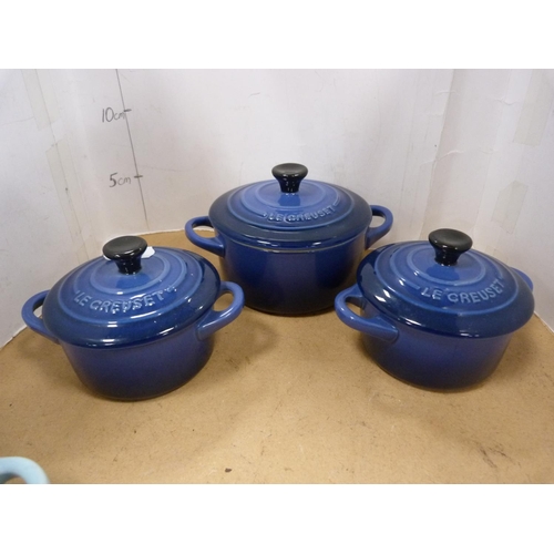 58 - Seven assorted petite Le Creuset casseroles with covers.  (7)