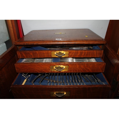 13 - Oak cased three drawer canteen of EPNS cutlery, 55cm wide.