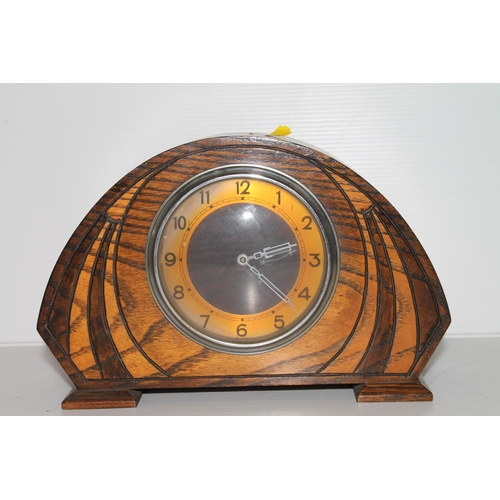 34 - Art Deco style oak cased Smiths mantel clock, 14cm.