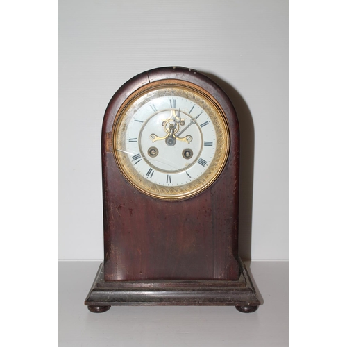36 - Victorian mahogany cased arch top mantel clock with visible anchor escapement, 32cm.