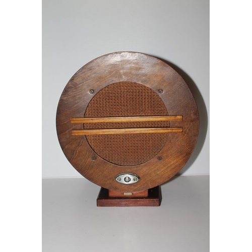39 - Unusual circular vintage speaker on plinth base, small plaque engraved A.C 1943, 33cm.