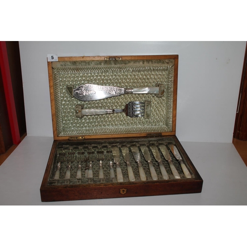 5 - Mahogany cased part canteen of fish knives and forks, with mother-of-pearl handles.
