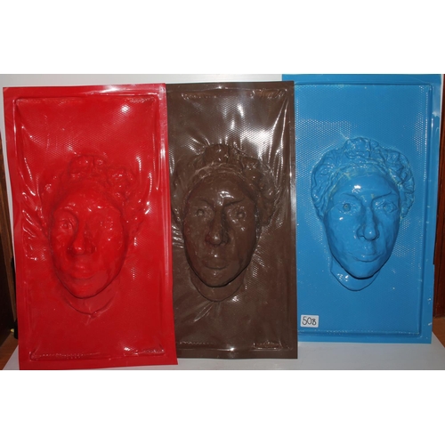 50B - Three plastic wall mask moulds, 46cm.