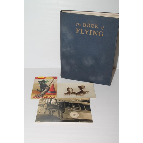 50C - The book of flying and three postcards.