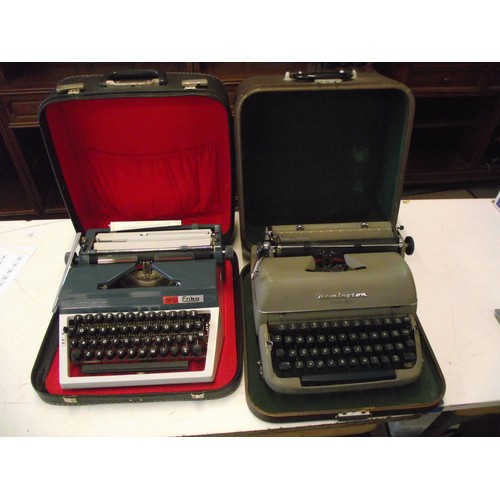 8 - 2 Retro Typewriters cased.