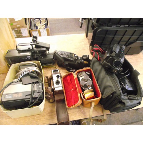 13 - Large box of vido camcorders and cine cameras.