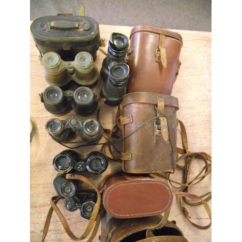 28 - 6 pair of vintage binoculars.