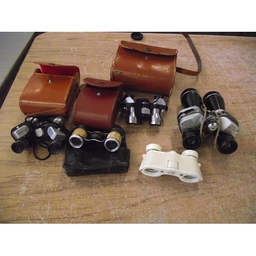 30 - 5 small pair of binoculars.