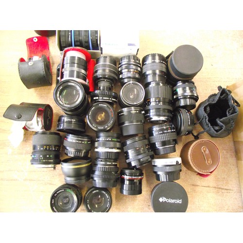39 - Large amount of some good quality small camera lenses.