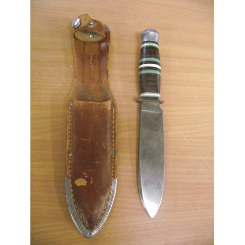 601 - Good quality Solingen German Knife in scabbard.