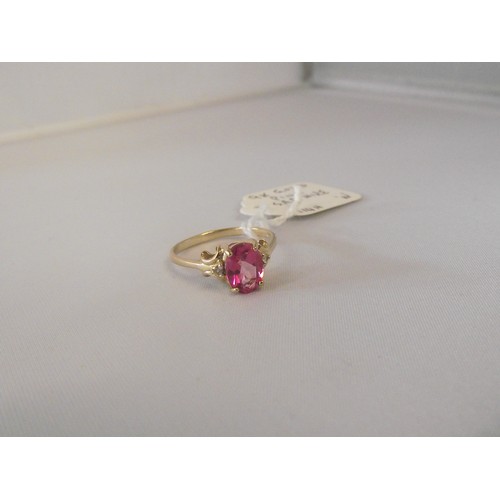 649 - 9ct gold pink sapphire oval ring size n